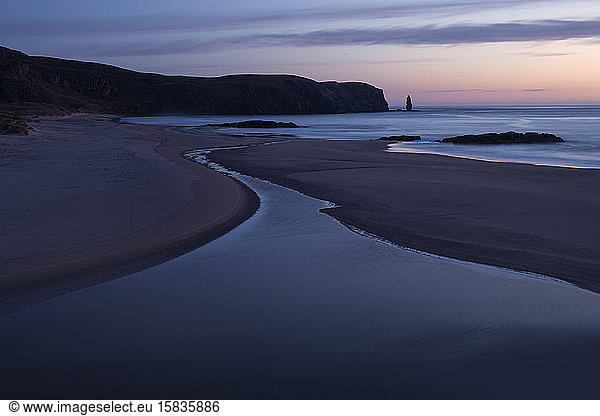 Twilight light over Isolated Sandwood bay beach  Sutherland  Scotland