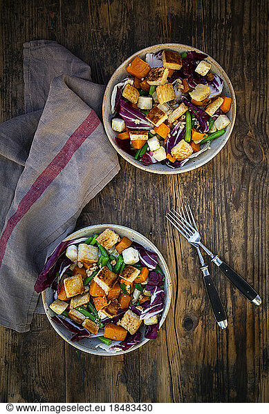 Two bowls of ready-to-eat vegan salad