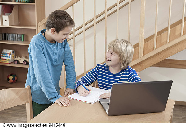Two boys with homework