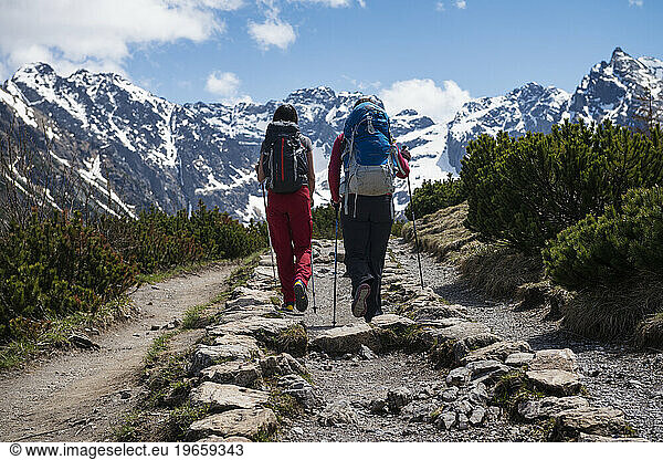 Two female hikers hiking in Tatra mountains  Poland