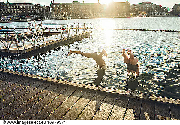 Two Friends Diving Into Freezing Water in Copenhagen  Denmark