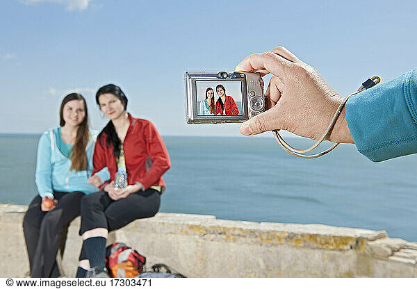 two friends posing for a picture at Swanage / UK