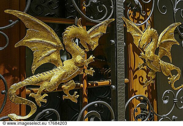 Two golden dragons at the entrance gate  medieval restaurant tavern Drachenfeuer  Meersburg  Lake Constance  Baden-Wüttemberg