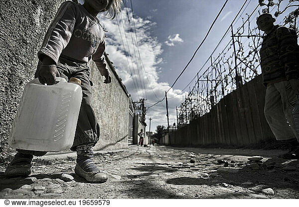 Two hundred souls in a handful of huts surrounded by plastic  sheet metal and garbage. They are gipsy.