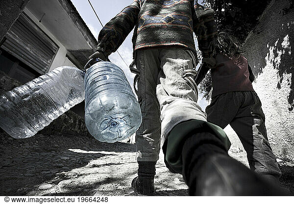 Two hundred souls in a handful of huts surrounded by plastic  sheet metal and garbage. They are gipsy.