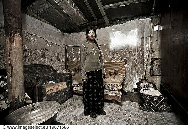 Two hundred souls in a handful of huts surrounded by plastic  sheet metal and garbage. They are gipsy.