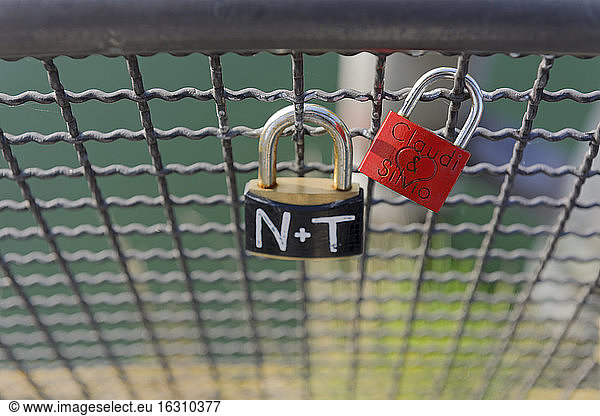 Two love locks at grid