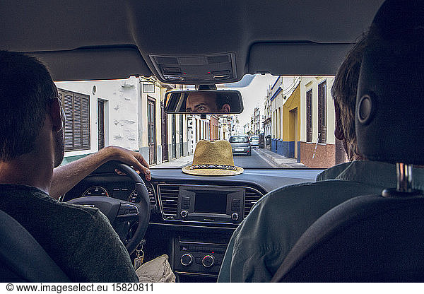 Two man driving in a car in the streets of San Sebastian  La Gomera  Spain