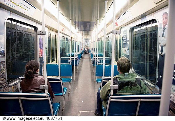 Two passengers travel by underground in Rotterdam  Netherlands