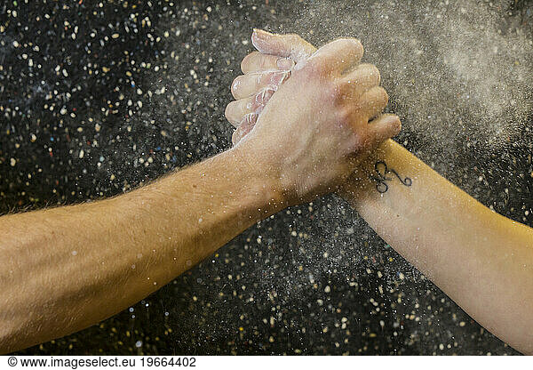 Two people doing a grip check after an intense work out