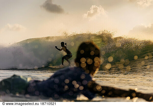 Two surfers in sea