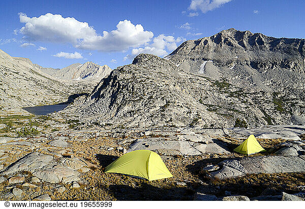 Two tents are set up on the Sierra High Route near Cirque Pass  CA.