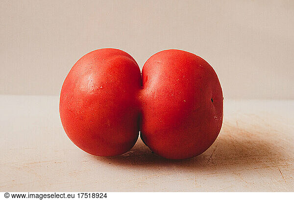 two tomatoes united in one