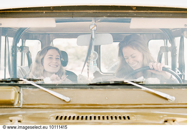 Two women on an outing in the desert  driving in a 4x4.