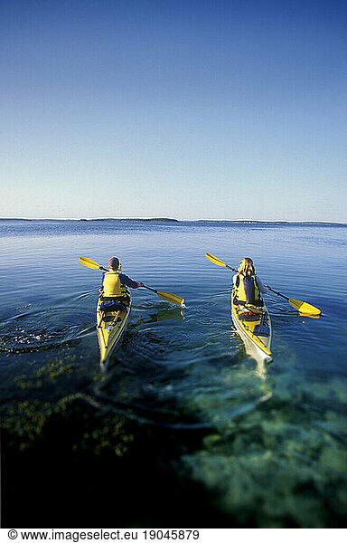 Two women set out on a kayak adventure  Muscongus Bay  Maine.