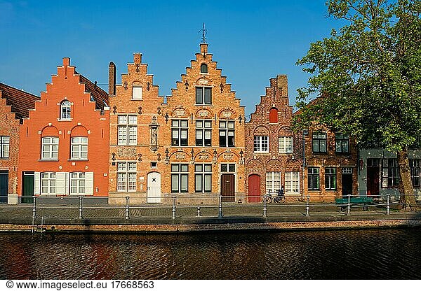Typical Belgian cityscape Europe tourism concept  canal and old houses on sunset  Bruges (Brugge)  Belgium