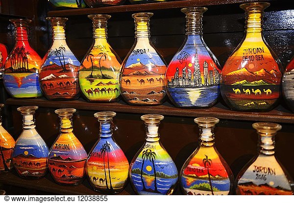 Typical Souvenir  handcrafted sand bottles with desert-motives  camels and palmtrees  Jordan  Asia