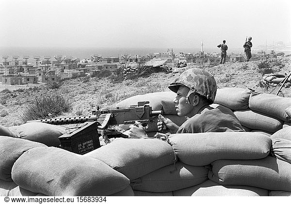 U.S. Marine aims Machine Gun from Foxhole during Lebanon Crisis  Beirut  Lebanon  photograph by Thomas J. O'Halloran  July 1958