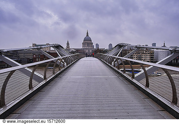 UK  England  London  Diminishing perspective of Millennium Bridge with Saint Pauls Cathedral in background