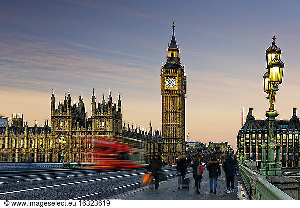 UK  London  Big Ben  Houses of Parliament and bus on Westminster Bridge at dusk