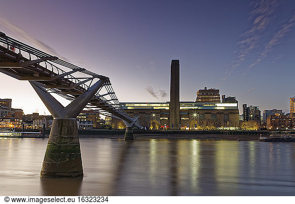 UK  London  Tate Gallery of Modern Art and Millennium Bridge at twilight
