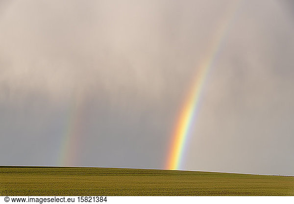 UK  Scotland  Double rainbow against cloudy sky
