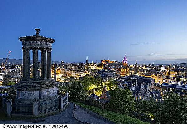 UK  Scotland  Edinburgh  View from Calton Hill at dusk with Dugald Stewart Monument in foreground