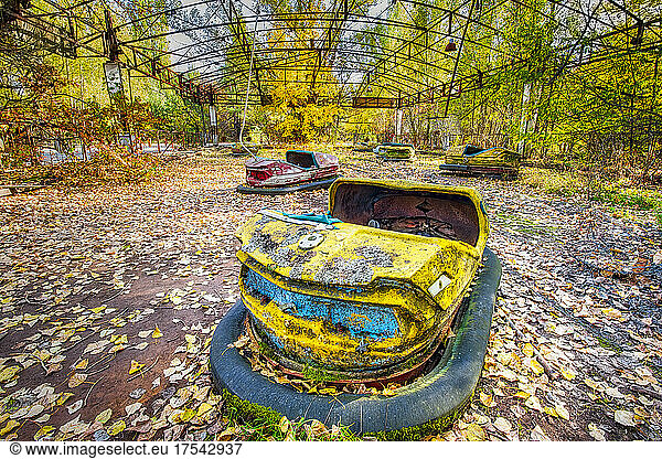 Ukraine  Kyiv Oblast  Pripyat  Abandoned bumper cars in Pripyat Amusement Park