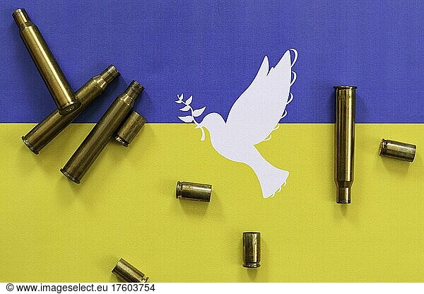 Ukrainian flag with peace dove and cartridge cases  Ukrainian War