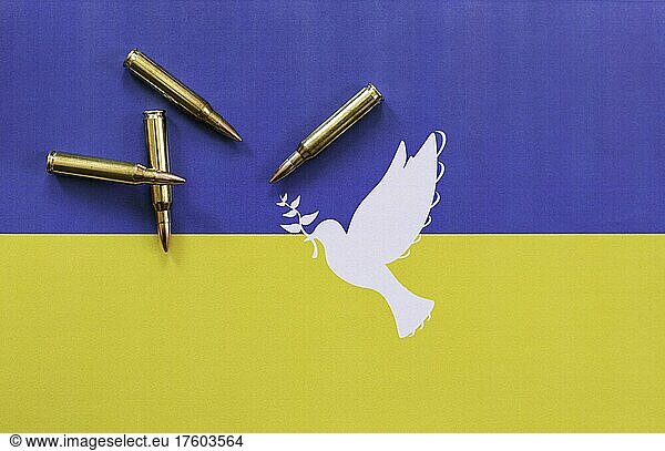 Ukrainian flag with peace dove and cartridges  Ukrainian war