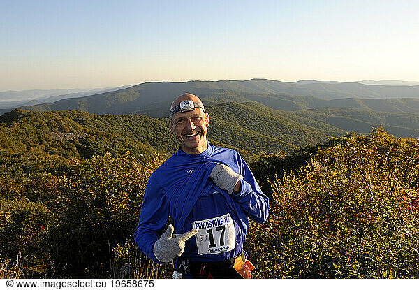 Ultra marathon runner  from Malver  PA  shows off his race number at Bird Knob - Shenandoah  Virginia during the Grind Stone 100