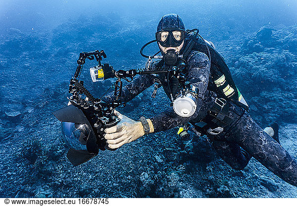 underwater photographer at the great Barrier Reef