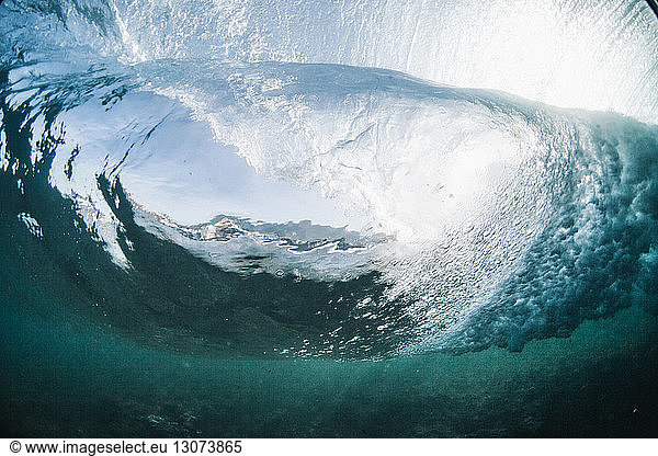 Underwater view of wave splashing in sea