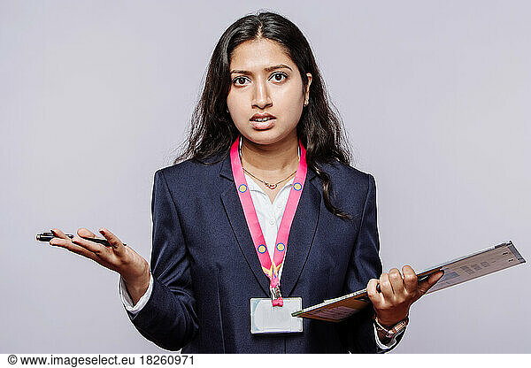 Unhappy young Indian woman frustrated by the indiscipline in iso