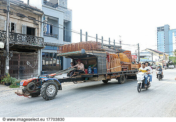 Unique truck transporting wares down a road in Cambodia; Kampot  Cambodia