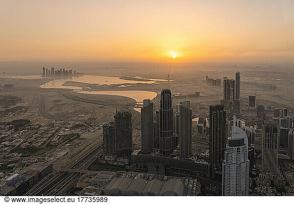 United Arab Emirates  Dubai  City downtown at foggy sunrise with Business Bay and Dubai Creek in background