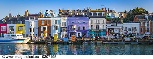 United Kingdom  Dorset  Weymouth  colourful harbour houses at seaside