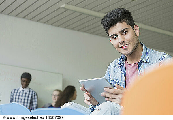 University student with a digital tablet in classroom School  Bavaria  Germany