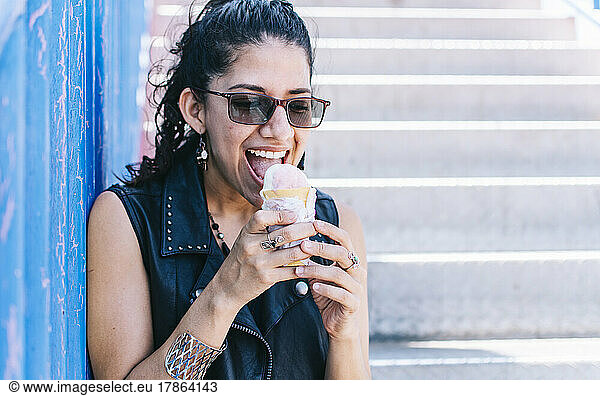 Urban girl eating an ice cream cone  A girl eating an ice cream