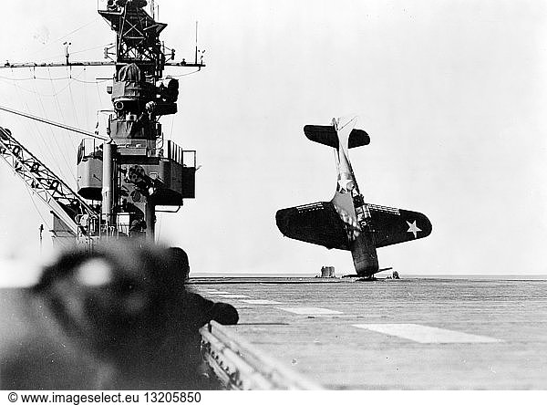 US Air Force  dive bomber  crash landing  on an American aircraft carrier
