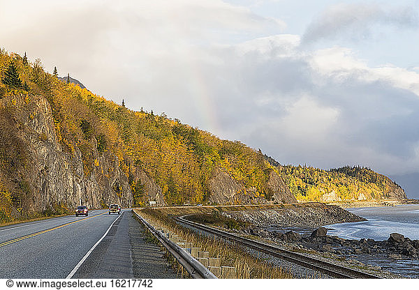 USA  Alaska  Car passing through Turnagain Arm along Seward Highway