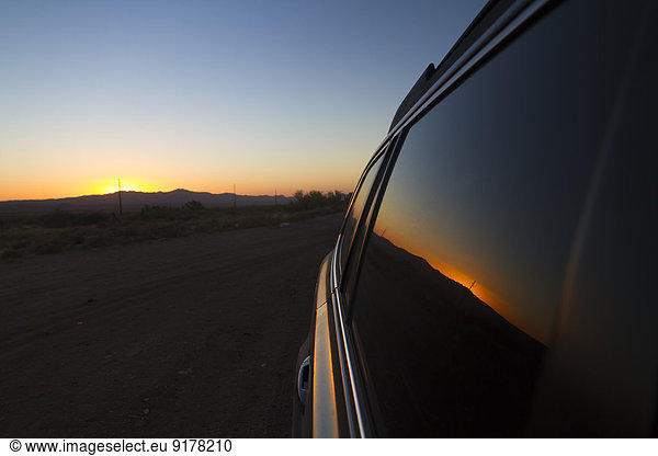 USA  Arizona  reflection of twilight at car window