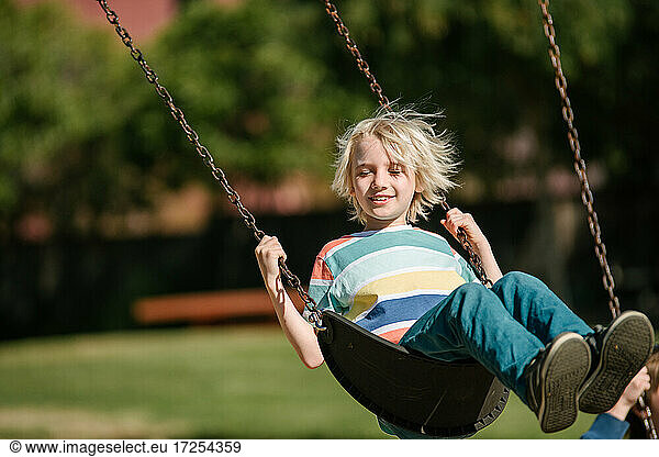 USA  California  San Francisco  Boy on swing in park