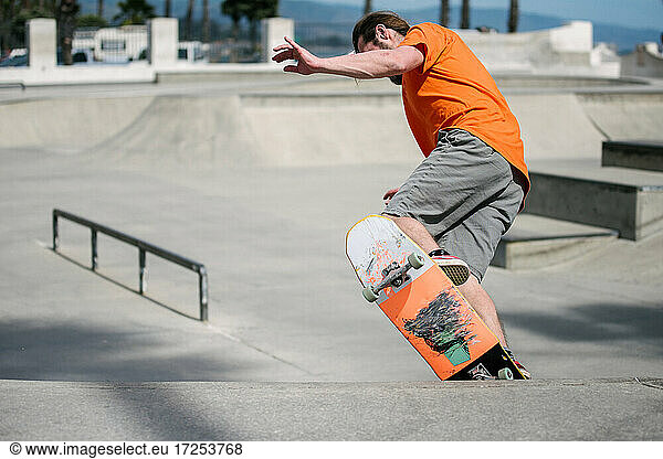 USA  California  Ventura  Man skateboarding in skate park