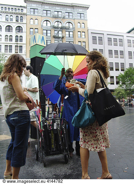 USA  United States of America  New York City: Street vendors sells umbrella after a rain shower.