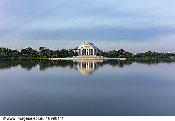 USA  Washington DC  Jefferson Memorial reflecting in Tidal Basin at dawn