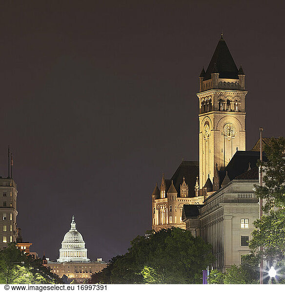 USA  Washington DC  Tower of Old Post Office at night with United States Capitol in background