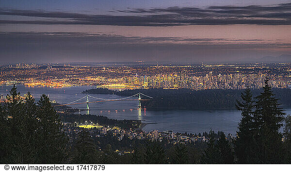 Vancouver city lit up at dawn.