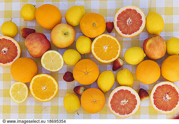 Variety of fresh citrus fruits on table