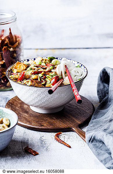 Vegan Kung Pao with tofu capsicum peanuts rice noodles